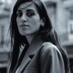 Sophisticated black and white portrait of a woman with long hair in Baku. Stylish and elegant look.
